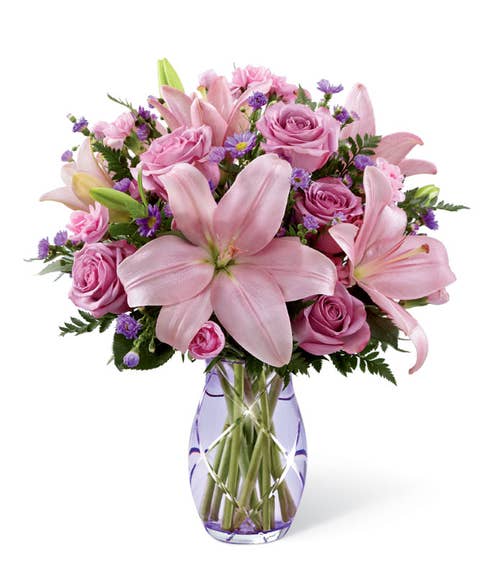 Pink lily bouquet from send flowers filled with cheap flowers