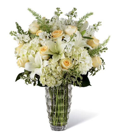 sympathy luxury white lily bouquet with white asiatic lilies, white roses and vase