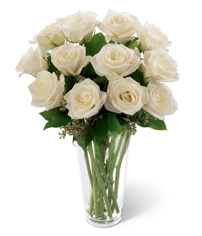 Long stem white roses in a clear glass vase online