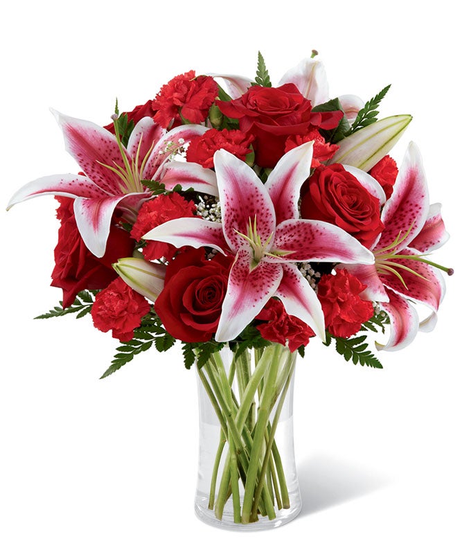 A Bouquet of Red Roses, Stargazer Lilies, Red Mini Carnations and Million Star Gypsophila in a Decorative Paint Can Inspired Vase