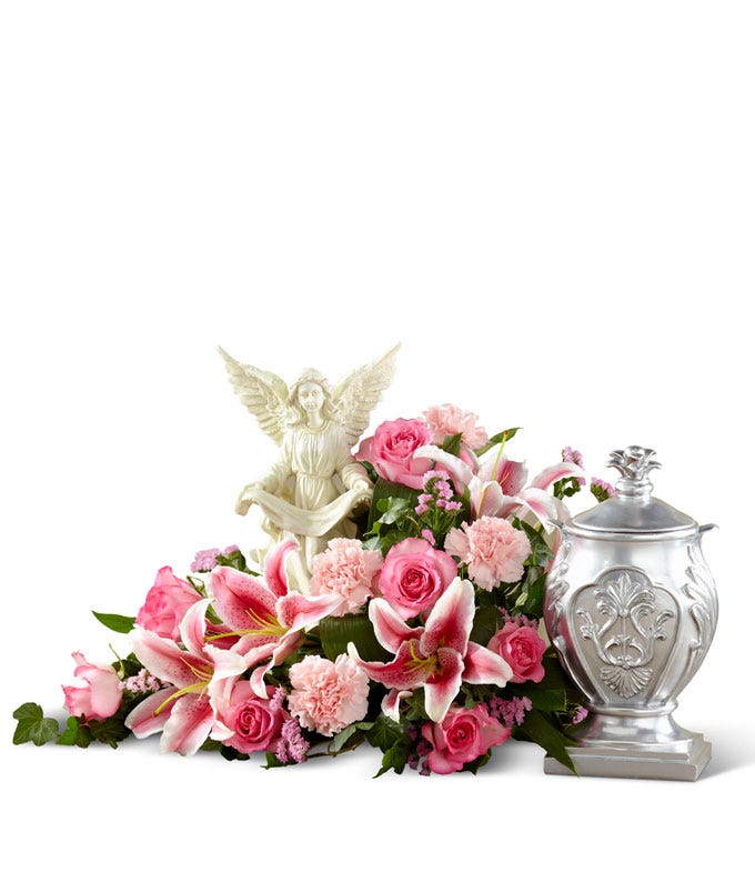 Pink red stargazer lily and white rose funeral flowers tabletop arrangement 