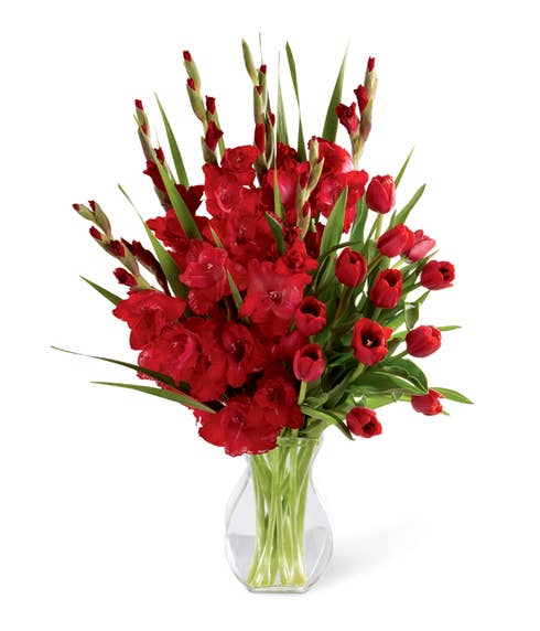 Red sympathy arrangement with tulips and gladiolus 