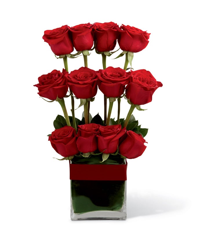A Bouquet of Dozen Red Roses, Tropical Greenery in a Modern Square Vase with Card Message and Decorative Bow