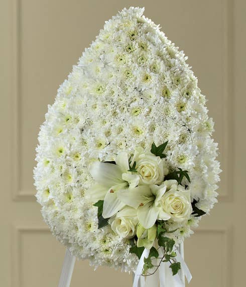 white flowers teardrop standing spray funeral flower delivery by send flowers