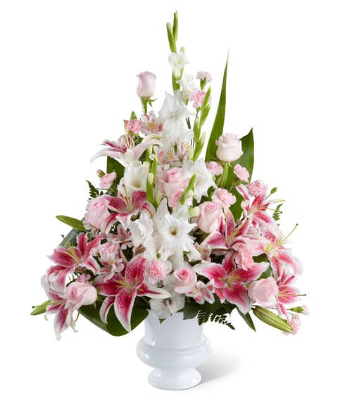 Florist arranged sympathy floral bouquet with pink roses and peruvian lilies