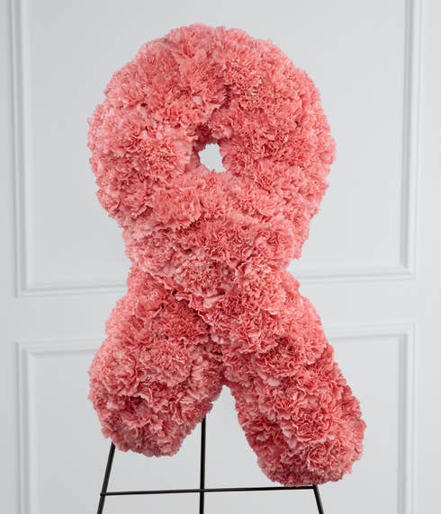Breast cancer awareness standing spray for funeral flowers delivery