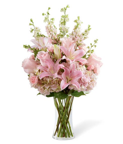 Pink flower sympathy vase arrangement with roses and lilies