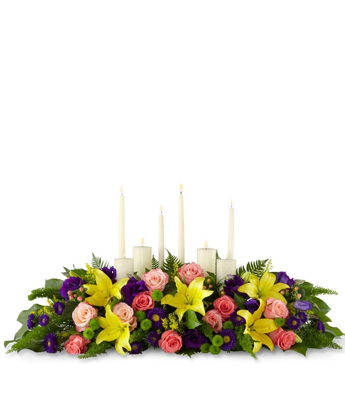 Altar Arrangement Including Coral Roses, Peach Roses, Purple Lisianthus, Yellow Asiatic Lilies, Purple Asters and Lush Greens