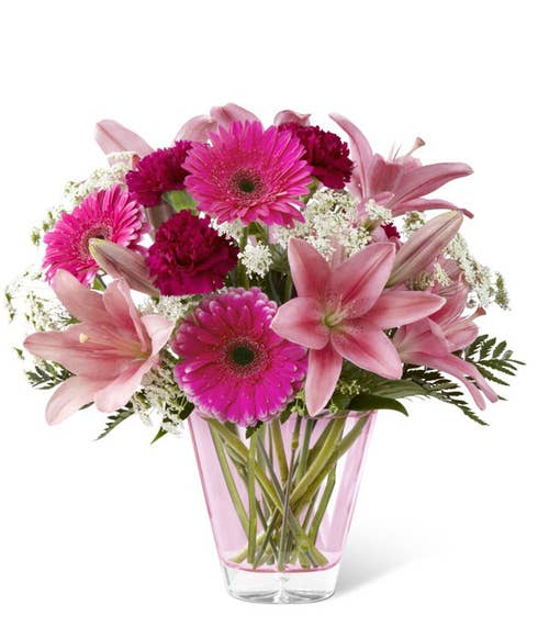 Fuchsia gerbera daisies, pink Asiatic Lilies and hot pink carnations