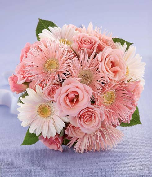 Pink gerbera daisies in a florist delivered bouquet