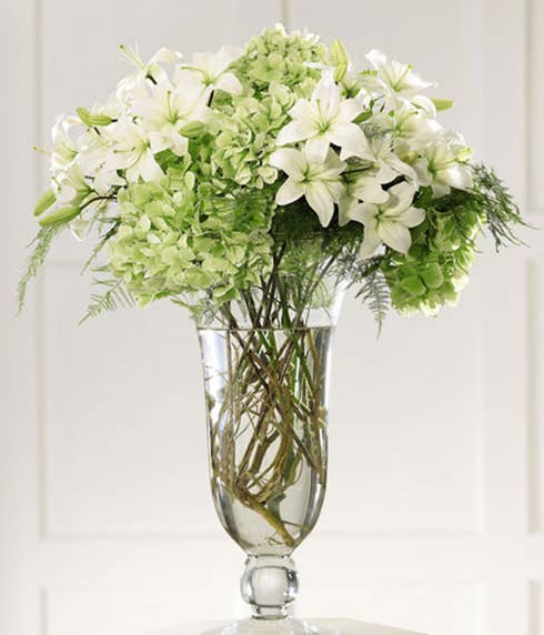 Altar flower arrangements and white orchids