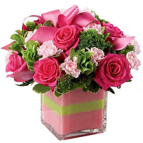 Light pink mini carnations with roses and bells of ireland bouquet