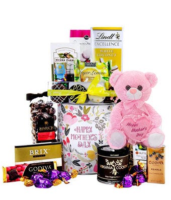 New baby boy gift basket with stuffed teddy bear and baby toys