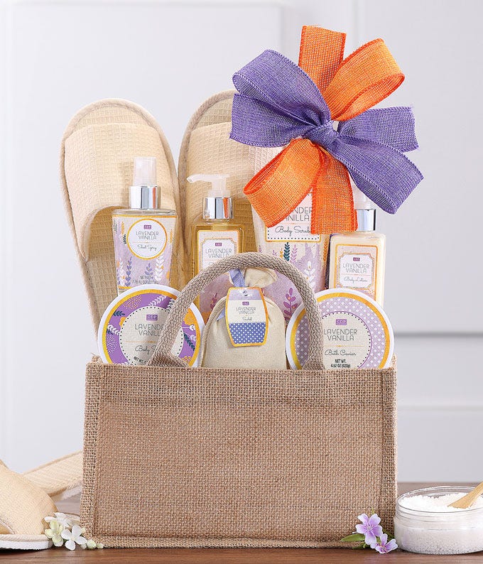 A Basket of  Body Lotion and Spray, Shower Gel, Bath Scrub, Exfoliation Brush, Slip On Slippers and Soft Loofah