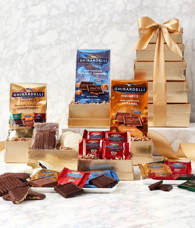 Elegant Mother's Day Golden Gift Tower with an assortment of Ghirardelli chocolates, chocolate dipped graham crackers, and white chocolate Oreos, complete with a personal message card.