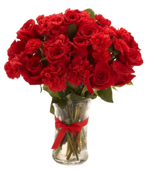 Red carnations and roses arrangement bouquet 