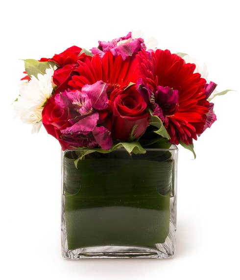 Red gerbera daisy bouquet with purple alstroemeria and red roses