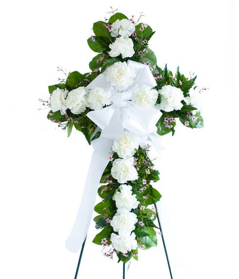 White sympathy cross flower standing spray with easel stand included