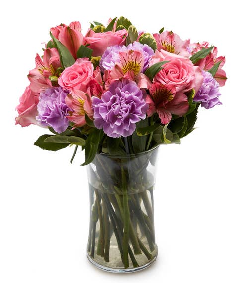 Pastel flowers arrangement with lavender carnations and pink roses