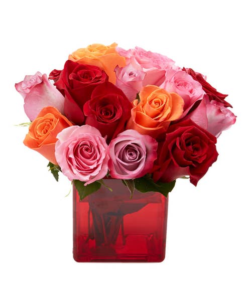 Sundry mixed rose bouquet in deep red vase vase