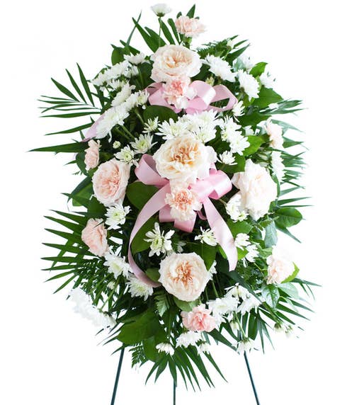 Cheap pink rose and carnation standing spray for a funeral with easel