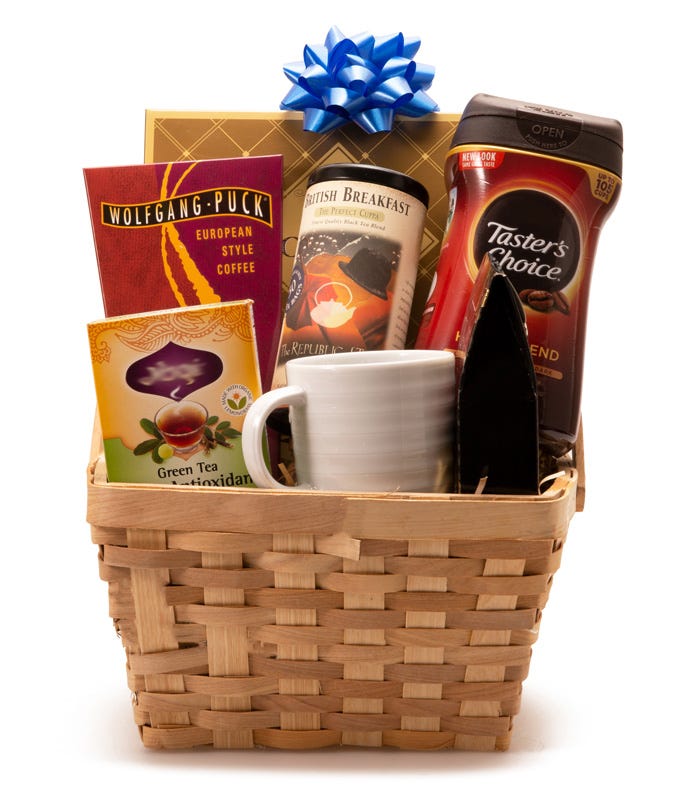 A Bouquet of Coffee Bean Varieties, Tea Variety, Gourmet Cookies And Chocolate, Ceramic Cup on  a Woven Basket with Decorative Blue Bow
