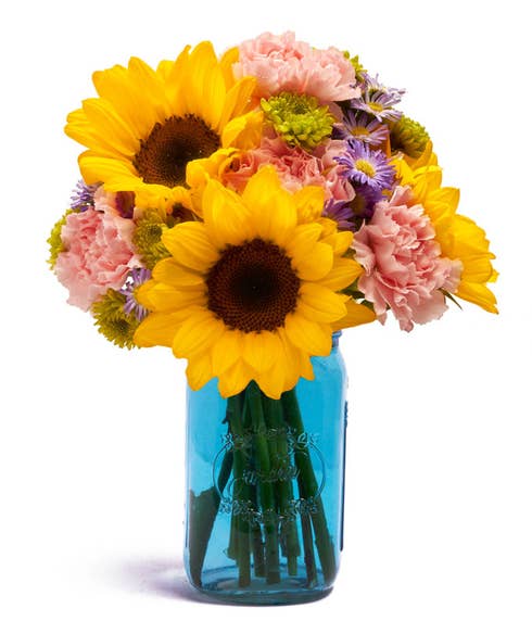 Blue mason jar sunflower arrangement, flowers in a mason jar bouquet