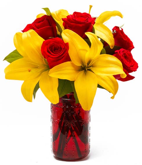 yellow lily red rose bouquet with yellow lilies and red roses 