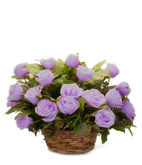Lavender rose basket flowers arrangement with lavender roses and card