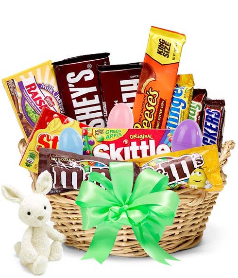 Easter candy gift basket with plastic eggs and stuffed animal