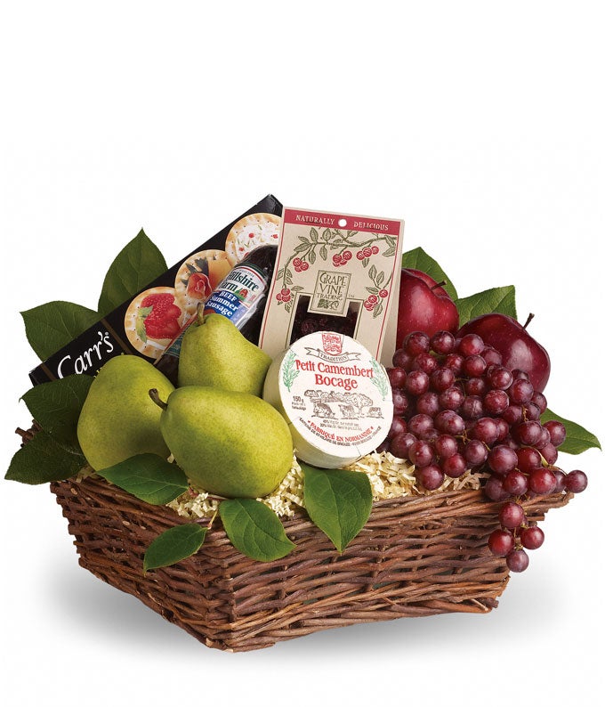 gift basket with fresh fruit, snacks, and cheese