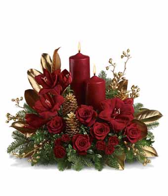 Holiday Amaryllis and red rose candle flower centerpiece with gold spray leaves