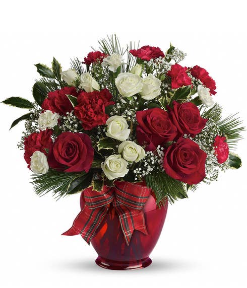 Christmas holiday red roses and miniature white roses winter flowers bouquet