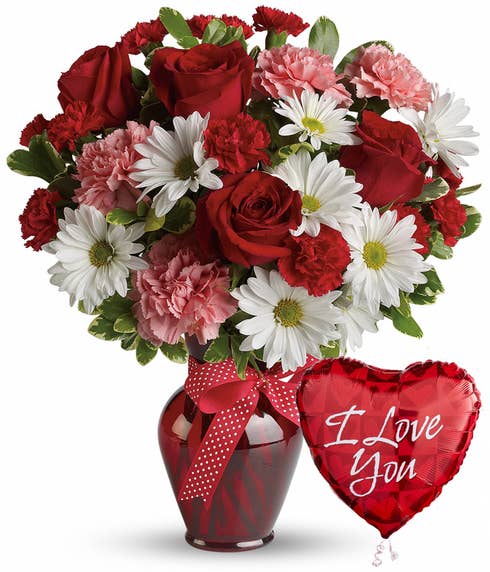 I love you balloon with red roses, pink carnations and white daisies in a red vase
