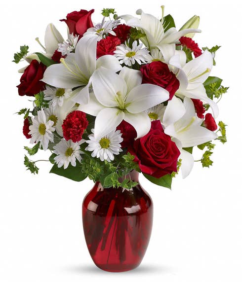 Romantic red rose white lily flowers bouquet with white daisies and red vase
