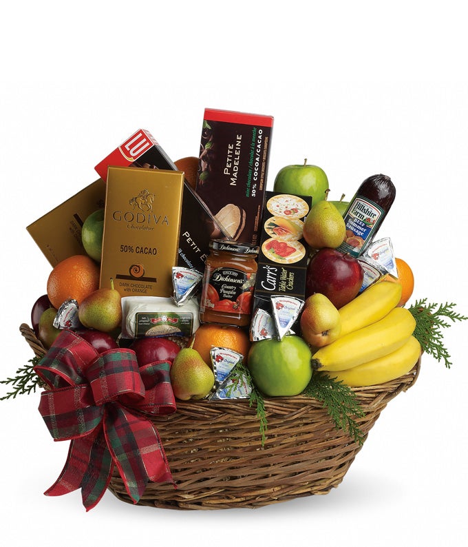 Assorted Seasonal Fruits, Cheeses And Crackers, Premium Chocolate Bars, Sausage, Cookies with Cute Tied Bow on a basket