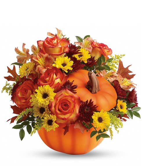 Pumpkin flower arrangement with orange roses, yellow daisy mums and pumpkin vase