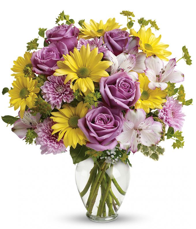 A Bouquet of Lavender Roses, Yellow Daisy Spray Mums, Lavender Alstroemeria, and Lavender Cushion Spray Mums in a Glass Vase