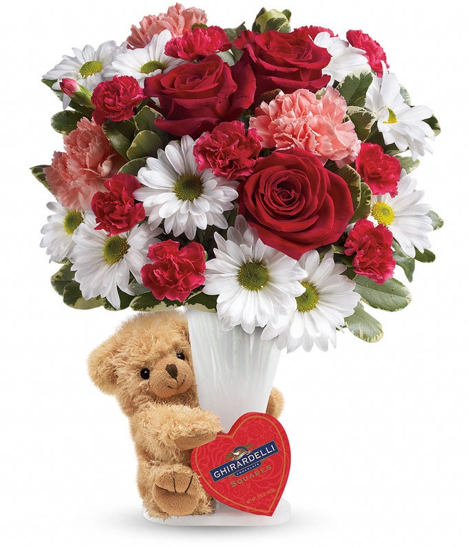 teddy bear with flower bouquet and chocolates