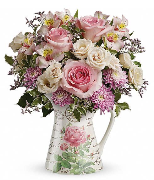 Floral print water pitcher with light-pink roses and pastel spring flowers