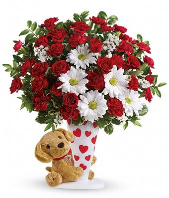 Stuffed animal dog delivery with red roses bouquet and white daisies