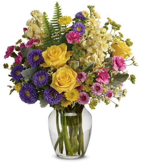spring flower bouquet in a clear glass vase for same day flower delivery online