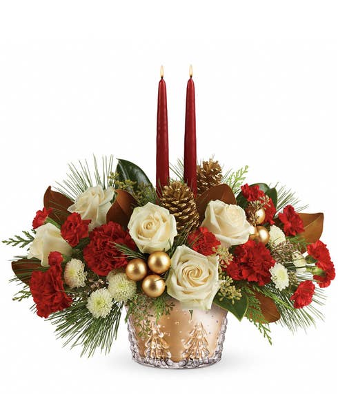 Christmas holiday red and gold flowers and candle centerpiece with ornaments