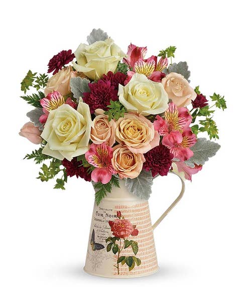 Peach rose flower pitcher bouquet with peach roses white roses pink alstroemeria