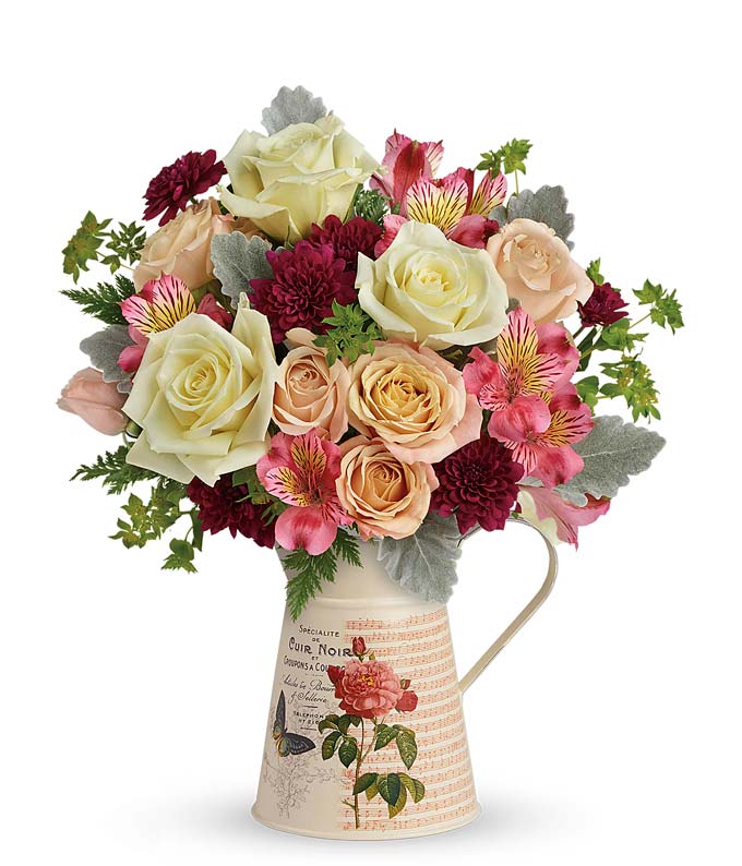 Peach rose flower pitcher bouquet with peach roses white roses pink alstroemeria