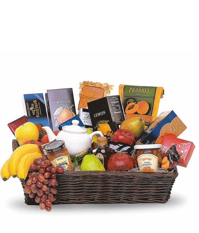 Apples, Oranges, Bananas, Grapes, Pears, Pomegranate, Dried Apricots, Honey, Caramel Corn, Biscuits, Shortbread, Orange Spread and Marmalade, Chocolate and Truffles, Herbal Tea with Small Ceramic Pot in a Large Keepsake Basket