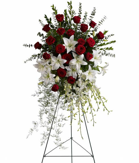 white lily and red rose standing spray for funeral, visitation, and memorial service