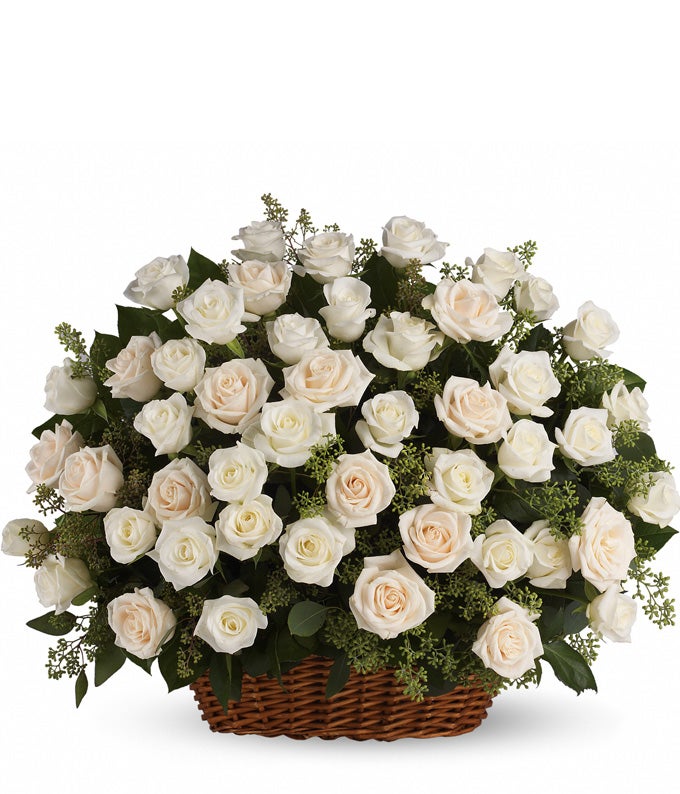 Flower Arrangement Including Cream Roses, White Roses and Seeded Eucalyptus in a Rectangular Basket