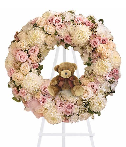 Baby girl funeral flowers standing spray wreath with teddy bear and easel