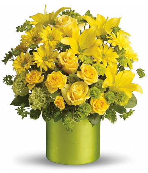 Yellow roses in green vase with green flowers from SendFlowers